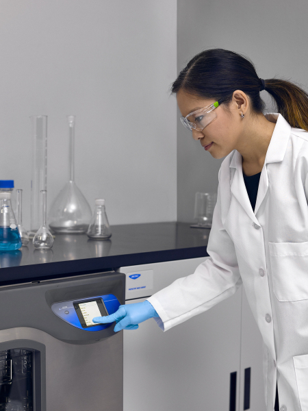 Undercounter FlaskScrubber Glassware Washer, with Scientist Using Touch Screen