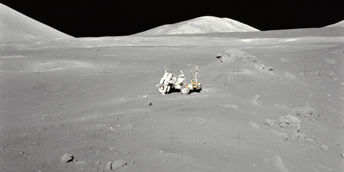 Moon rover in regolith on lunar surface